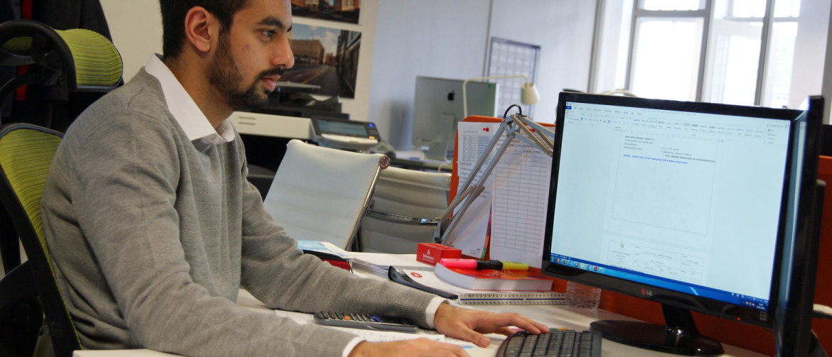  A man working at a computer