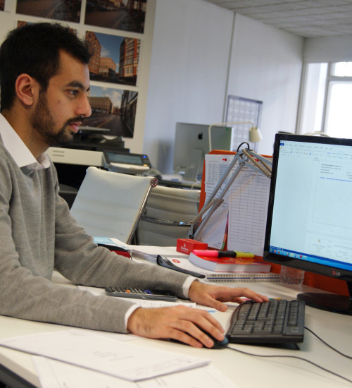  A man working at a computer